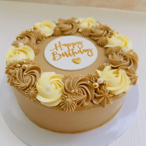 coffee cake covered in coffee butter icing