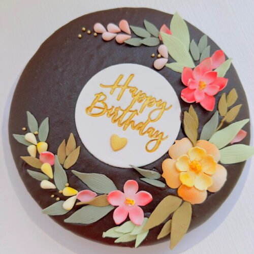 Perfect chocolate cake covered in rich chocolate ganache