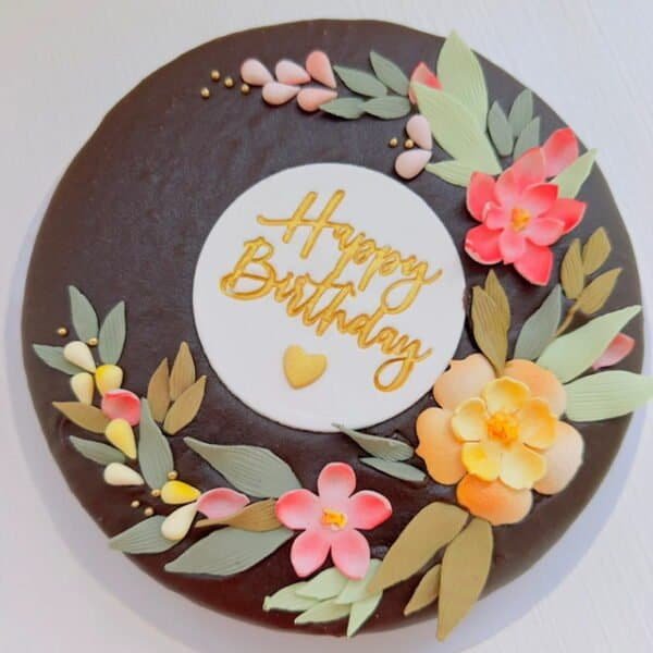 Perfect chocolate cake covered in rich chocolate ganache
